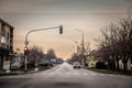 Selective blur on a old Zastava Yugo Koral car driving in a typical rural street in Alibunar, Banat, voivodina