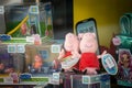 Selective blur on a Peppa pig plush stuffed toy, of the official franchise, for sale in a toys shop.