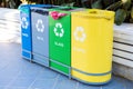 Selective collection of garbage colored containers with inscriptions for separate waste