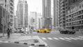 Selective color shot of a yellow taxi in a street in Dubai, UAE