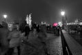 A selective colour scene of tourists dashing about in the snow, Royalty Free Stock Photo