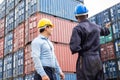 Selective focus at African black worker while talk and having discussion with supervisor and inspect the condition of all