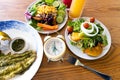 Selective focus of alarm clock which  Healthy food of salad Intermittent fasting concept. Time to lose weight , eating control or Royalty Free Stock Photo