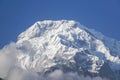 selective focus Annapurna mountain peak with thick white snow on top and bright sunshine in winter season Royalty Free Stock Photo