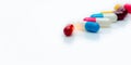 Selective focus on antibiotic capsule pills on white background. Pharmacy horizontal web banner. Prescription drugs. Antibiotic Royalty Free Stock Photo