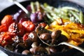 Selective focus. Baked vegetables in a pan. Healthy bright food. Cooking at home. Vegan diet. Royalty Free Stock Photo