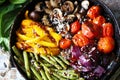 Selective focus. Baked vegetables in a pan. Healthy bright food. Cooking at home. Vegan diet. Royalty Free Stock Photo