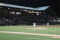 Selective focus on baseball foul ball safety netting.