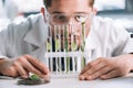 selective focus of bearded biochemist looking Royalty Free Stock Photo