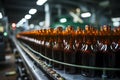 Selective focus on beer bottles on conveyor, shallow DOF highlights manufacturing precision