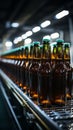 Selective focus on beer bottles on conveyor, shallow DOF highlights manufacturing precision