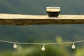 selective focus black coffee americano in a clear glass placed on a wooden balcony high angle nature background There is space for Royalty Free Stock Photo