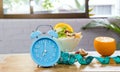 Blue clock  for  fast intermittent  hour feeding window concept or breakfast time with clock Royalty Free Stock Photo