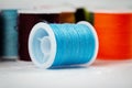 In selective focus of blue thread on background Royalty Free Stock Photo