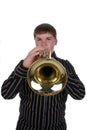 Selective focus of boy playing trumpet Royalty Free Stock Photo