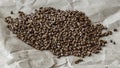 Selective focus of buckwheat tea in granules, on a sheet of kraft paper