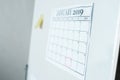 selective focus of calendar with january