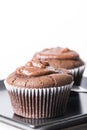Selective focus on chocolate cup cake muffin on the black square plate Royalty Free Stock Photo