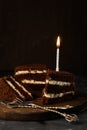 selective focus, chocolate sponge cake with birthday candle Royalty Free Stock Photo