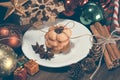The selective focus of christmas cookies on the dish, vintage toning