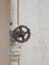 selective focus on the circular knob of metal pipe