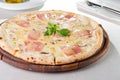 Selective focus Close up Delicious Pizza with bacon, sliced mushrooms and cream cheese on the wooden board on the served Royalty Free Stock Photo