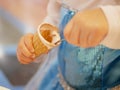 Close up of ice cream cone in baby`s hands Royalty Free Stock Photo