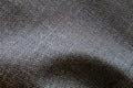 Selective focus, Close up shot of dark grey formal suit cloth textile surface. wool fabric texture for important luxury evening or Royalty Free Stock Photo