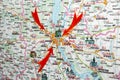 Selective focus close up shot of a low resolution map of Ukraine\'s capital, Kiev surrounded by red arrows