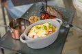 Selective focus and close up shot of well prepared beef juicy steak with luxury decoration of mash potato, sauce and tomatoes Royalty Free Stock Photo