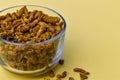 Selective focus closeup of a glass of dried carnation spices