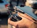 Selective focus closeup shot of a person holding black drone remote controller Royalty Free Stock Photo