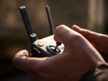 Selective focus closeup shot of a person holding black drone remote controller Royalty Free Stock Photo