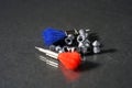 Selective focus closeup shot of tranquilizer darts with other small tools around Royalty Free Stock Photo