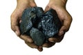 Selective focus of coal in worker`s hands