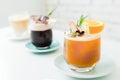 Selective focus of cocktails or mocktails with fruits in glasses.Traditional summer drink alcoholic cocktail with orange and grape Royalty Free Stock Photo