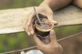 selective focus cocoa powder in a cup of black coffee in the hand of a man in the morning There is space for text Royalty Free Stock Photo