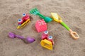 selective focus colorful children\'s toys on the sand Toy car and toy shovel concept in the technology age Children only play Royalty Free Stock Photo