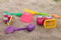 selective focus colorful children\'s toys on the sand Toy car and toy shovel concept in the technology age Children only play Royalty Free Stock Photo