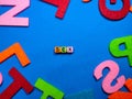 Selective focus.Colorful dice with word SEX on blue background.Shot were noise and film grain. Royalty Free Stock Photo