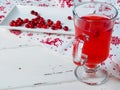 Selective focus on cranberries on a white rectangular ceramic plate