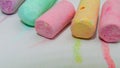 Selective focus on crayons for drawing different colors. Selective focus on crayons for drawing on asphalt in different colors Royalty Free Stock Photo