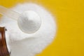 Selective focus of creatine monohydrate powder in scoop