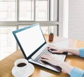 Selective focus cropped hand typing on keyboard,work online lifestyle relax at home with coffee Royalty Free Stock Photo