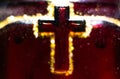 Selective focus of cross or crucifix surrounded by gold glitter bokeh balls Royalty Free Stock Photo