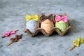 cute blue,orange  and green Easter eggs in funny bows Royalty Free Stock Photo