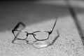 Selective focus on damaged glasses with scratched lens popped out