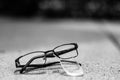 Selective focus on damaged glasses with scratched lens popped out