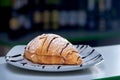 Selective focus of delicious croissant poured with chocolate