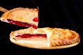 selective focus on delicious piece of cherry pie, on the foregro Royalty Free Stock Photo